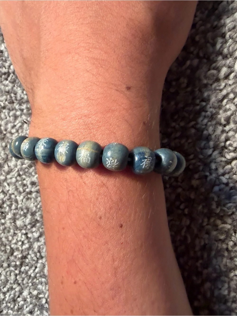 Blue Beaded Bracelet with White Chinese Symbol Detailing